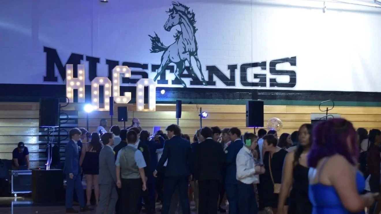 Students at a school homecoming dance