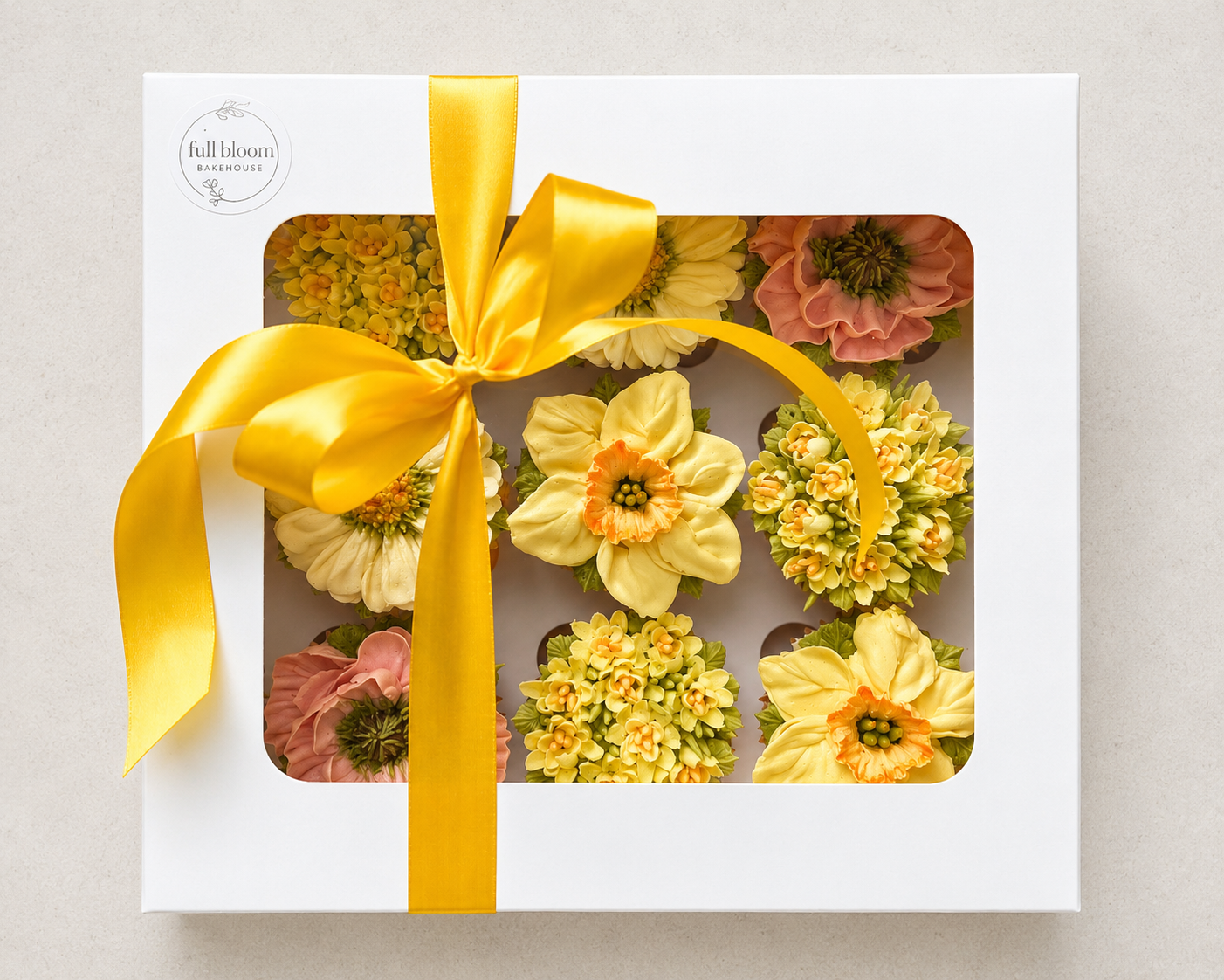 Hand-piped yellow daffodil, orange poppy and yellow crocus cupcakes, handcrafted in Dublin by Full Bloom Bakehouse. Inspired by spring gardens and Easter celebrations, these floral buttercream cupcakes bring vibrant seasonal colour to Easter gatherin