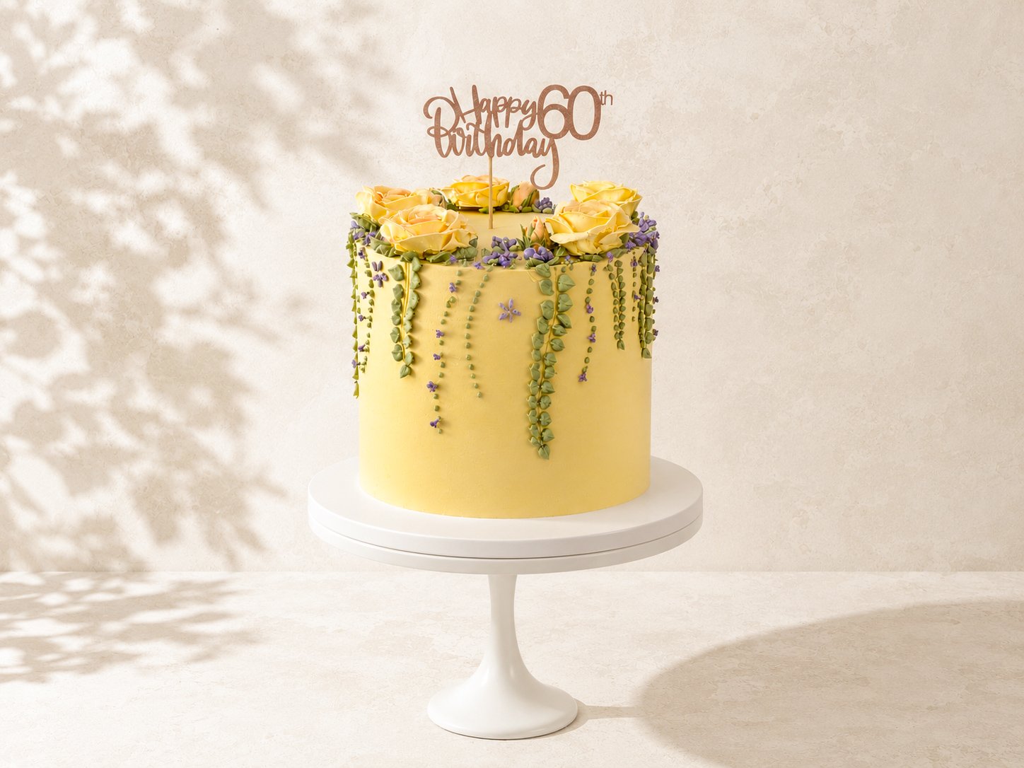 Tropical Velvet Floral Cake | Custom Birthday Cake in Dublin

This handcrafted buttercream cake is inspired by an English cottage garden in full bloom. Decorated with hand-piped buttercream roses, delicate trailing greenery and edible lavender blosso