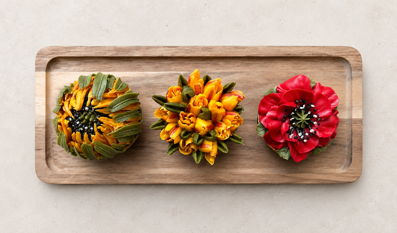 Hand-piped sunflower cupcakes, yellow tulips and red poppy buttercream flowers, handcrafted in Dublin by Full Bloom Bakehouse. Inspired by summer gardens and seasonal blooms, these luxury floral cupcakes are perfect for birthdays, celebrations, gifts
