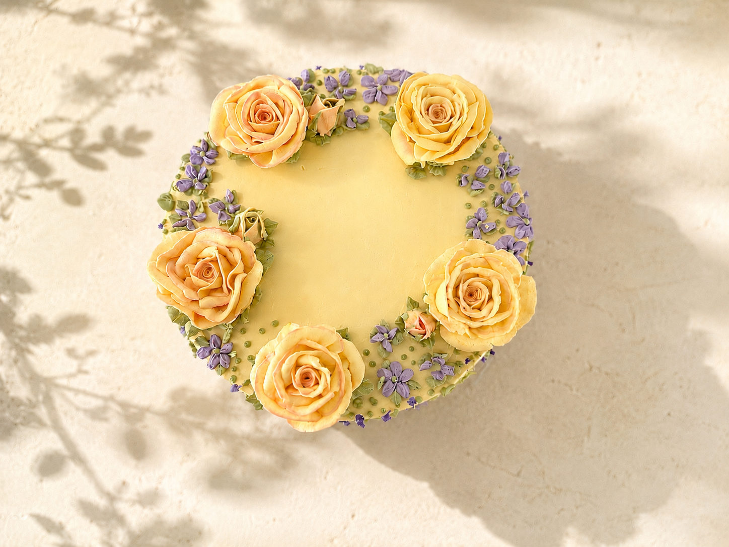 Luxury Floral Buttercream Cake | Tropical Velvet | Dublin

This elegant floral buttercream cake is decorated with handcrafted buttercream roses and delicate lavender details, creating a timeless design inspired by blooming summer gardens. Every flowe