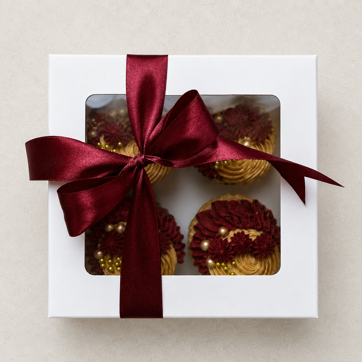 Elegant burgundy and gold swirl cupcakes, handcrafted in Dublin by Full Bloom Bakehouse. Perfect for New Year's Eve parties, evening celebrations, milestone birthdays, corporate events and sophisticated occasions for men. Luxury cupcakes available to