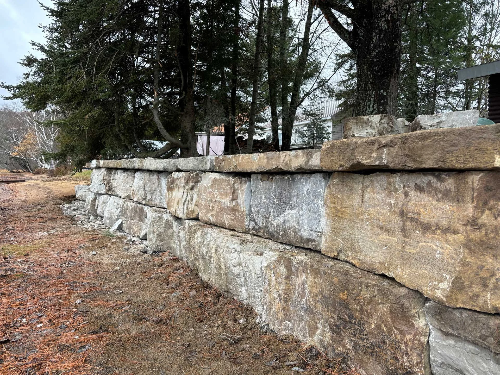 A shoreline retaining wall