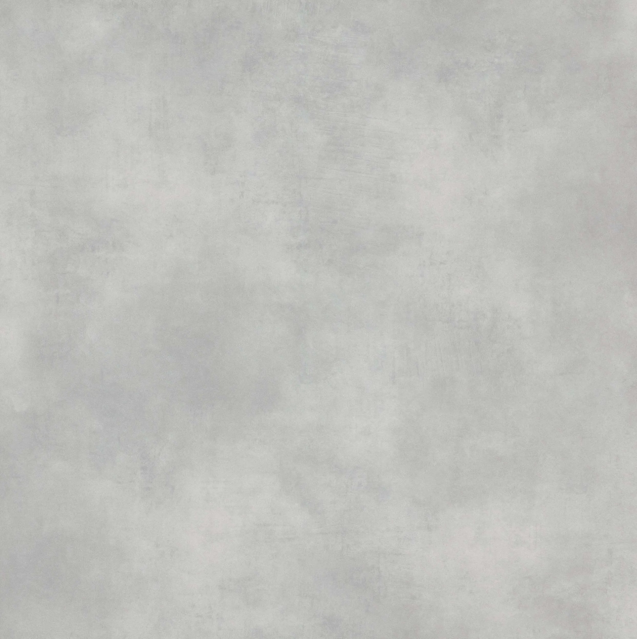 A plain, light gray or white textured surface, possibly paper or fabric.