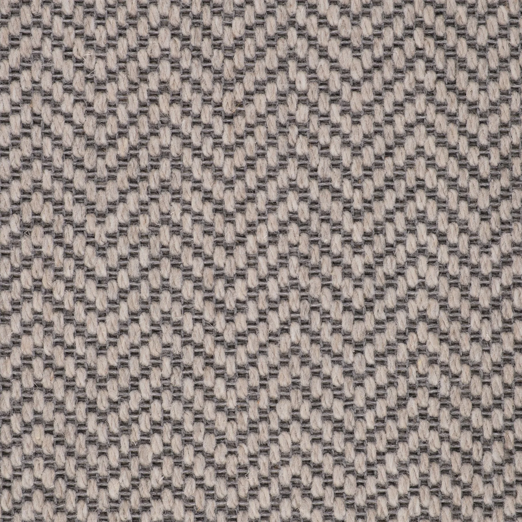 Close-up of woven fabric with a herringbone pattern in beige and gray tones.