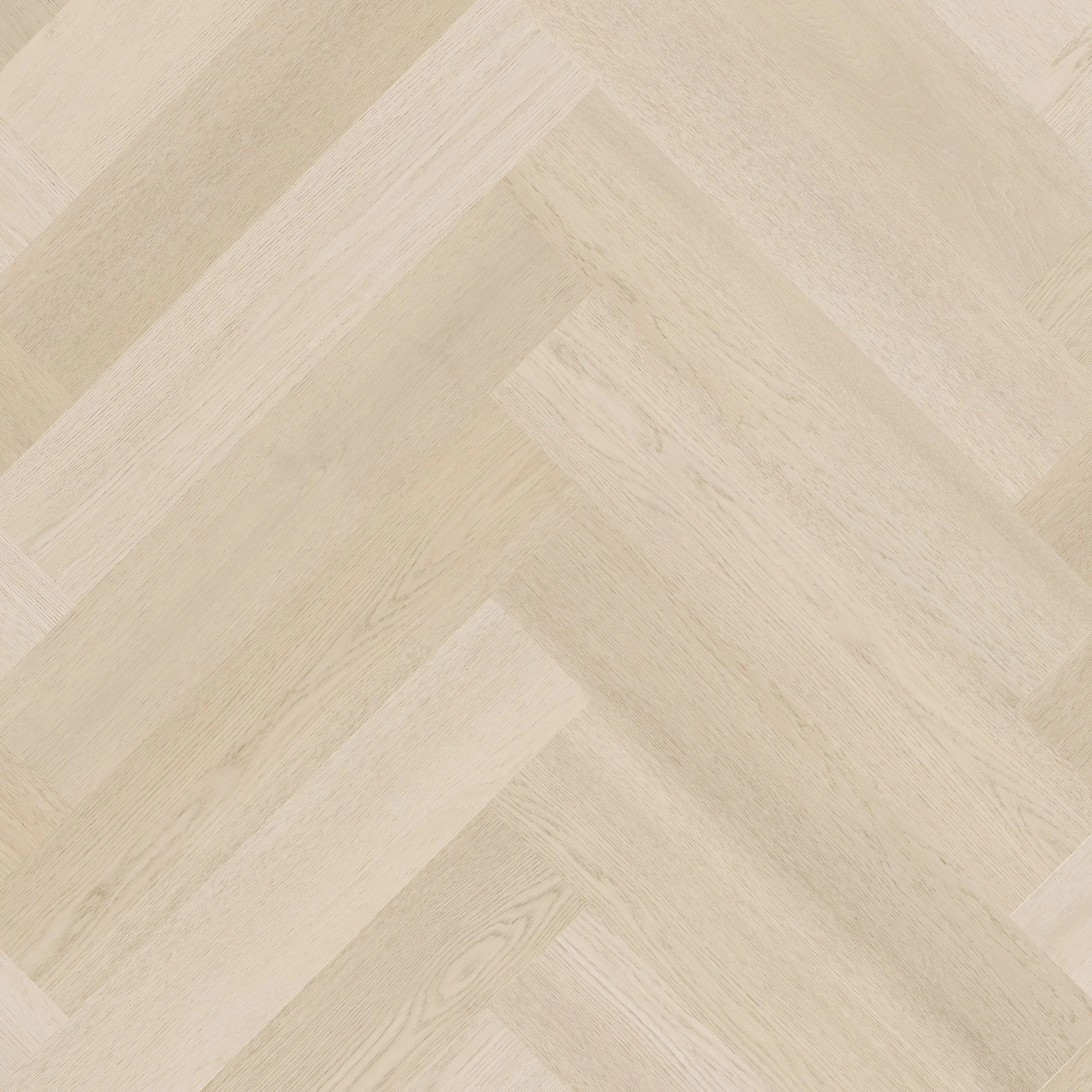Light-colored wooden flooring arranged in a herringbone pattern.