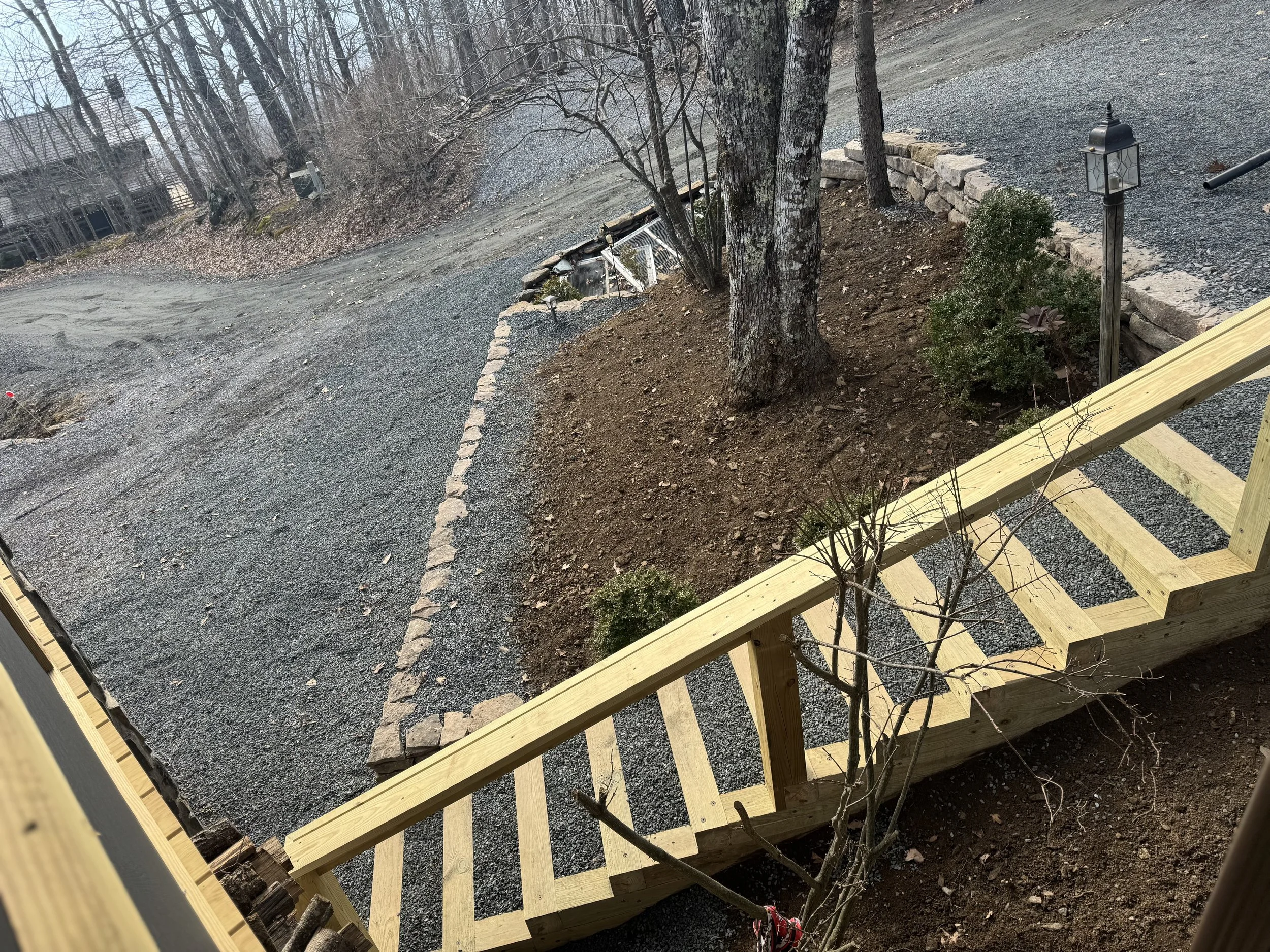 Newly built wooden stair by Antonio’s Construction providing exterior construction in Ashe County and Watauga County, NC