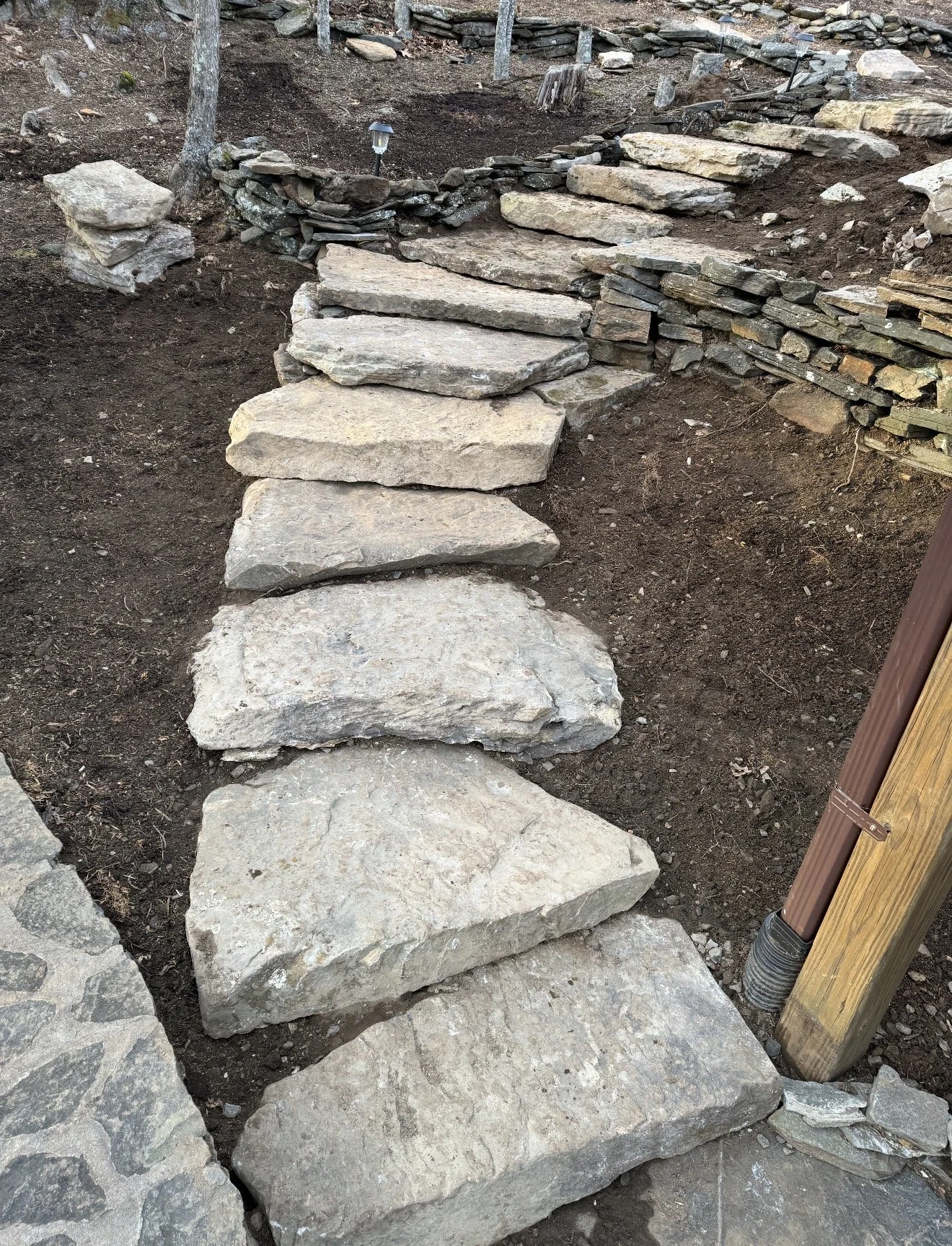 Stone pathway under construction by Antonio's Construction serving Ashe and Watauga County in North Carolina.