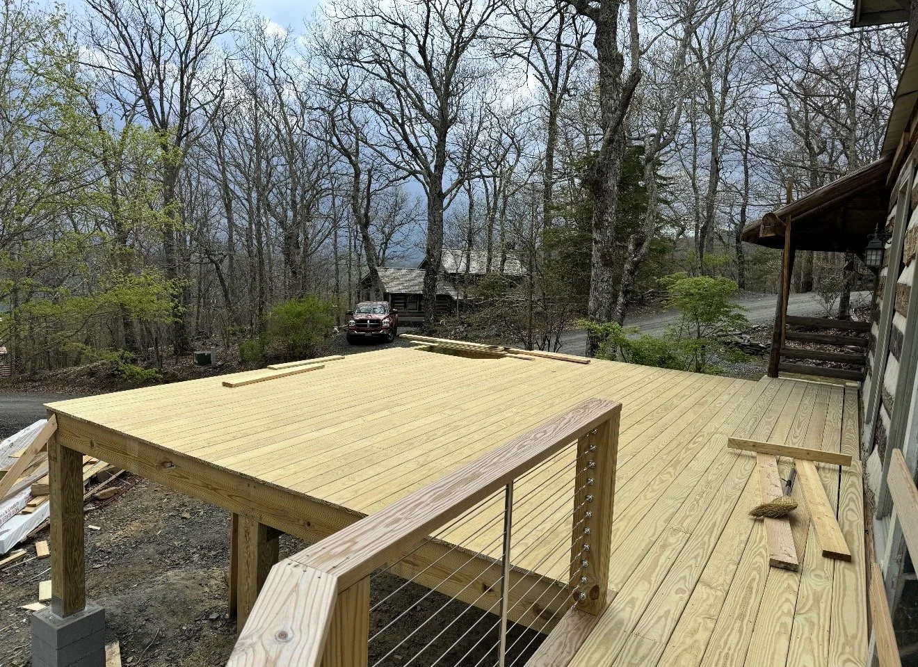 A wooden deck under construction by Antonio's Construction serving Ashe and Watauga County in North Carolina.