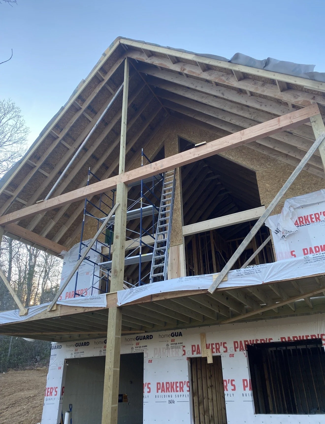 A house under construction with wooden framing by Antonio's Construction serving Ashe and Watauga County in North Carolina.