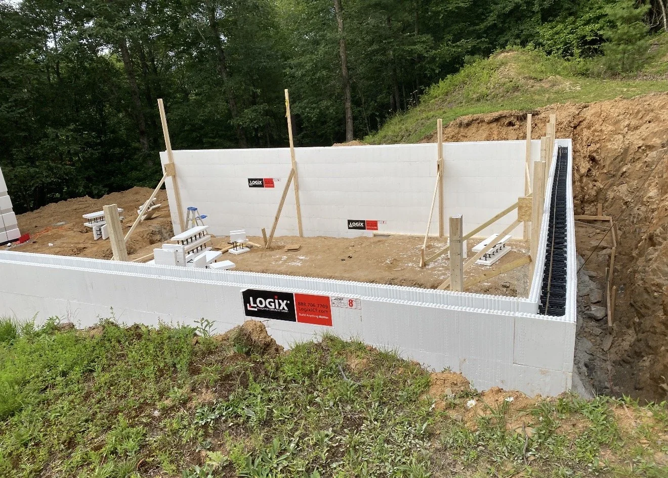 Construction site showing the early stages of building a foundation by Antonio's Construction serving Ashe and Watauga County in North Carolina.