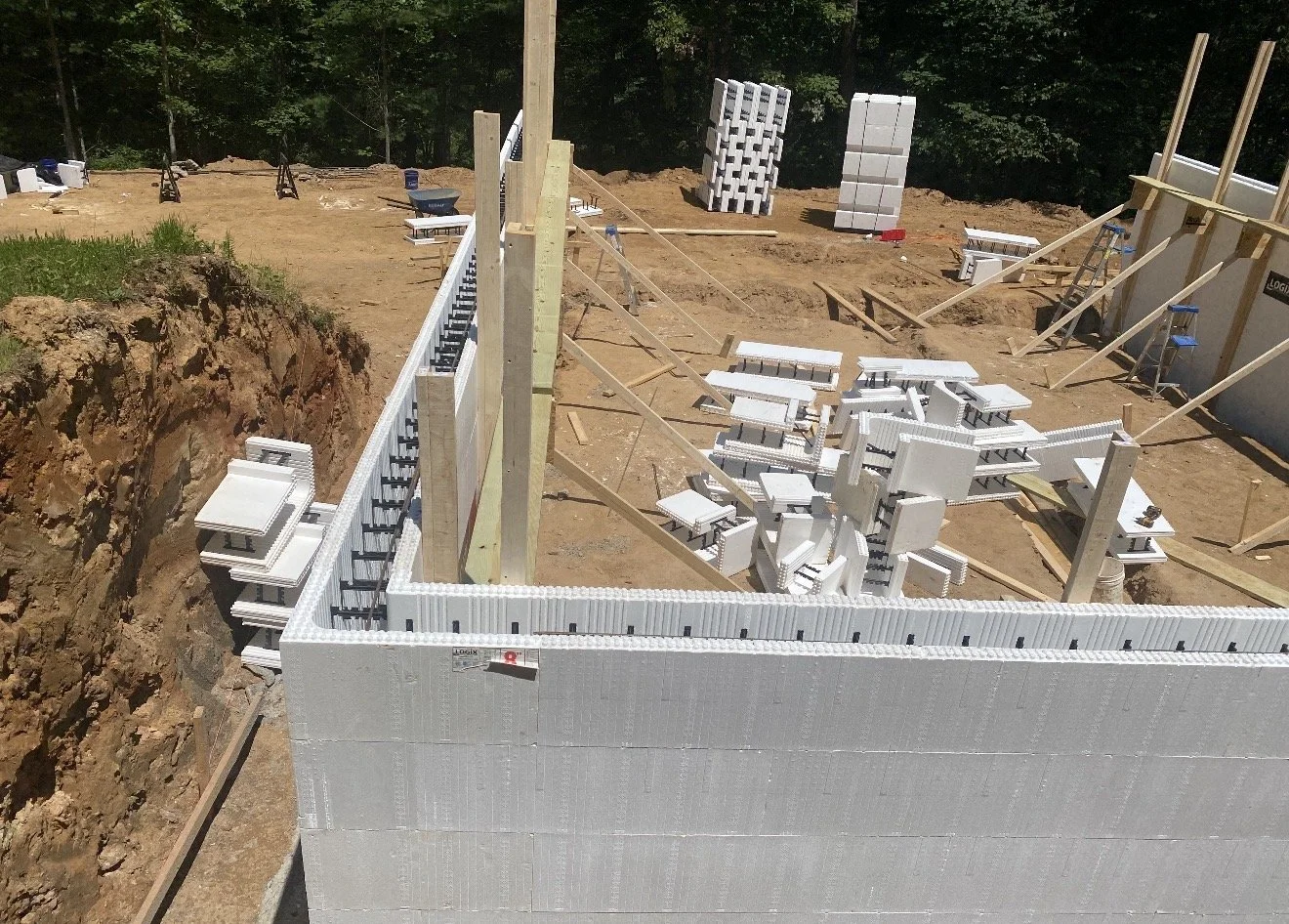 Construction site with foundation walls being built using insulated concrete forms by Antonio's Construction serving Ashe and Watauga County in North Carolina.