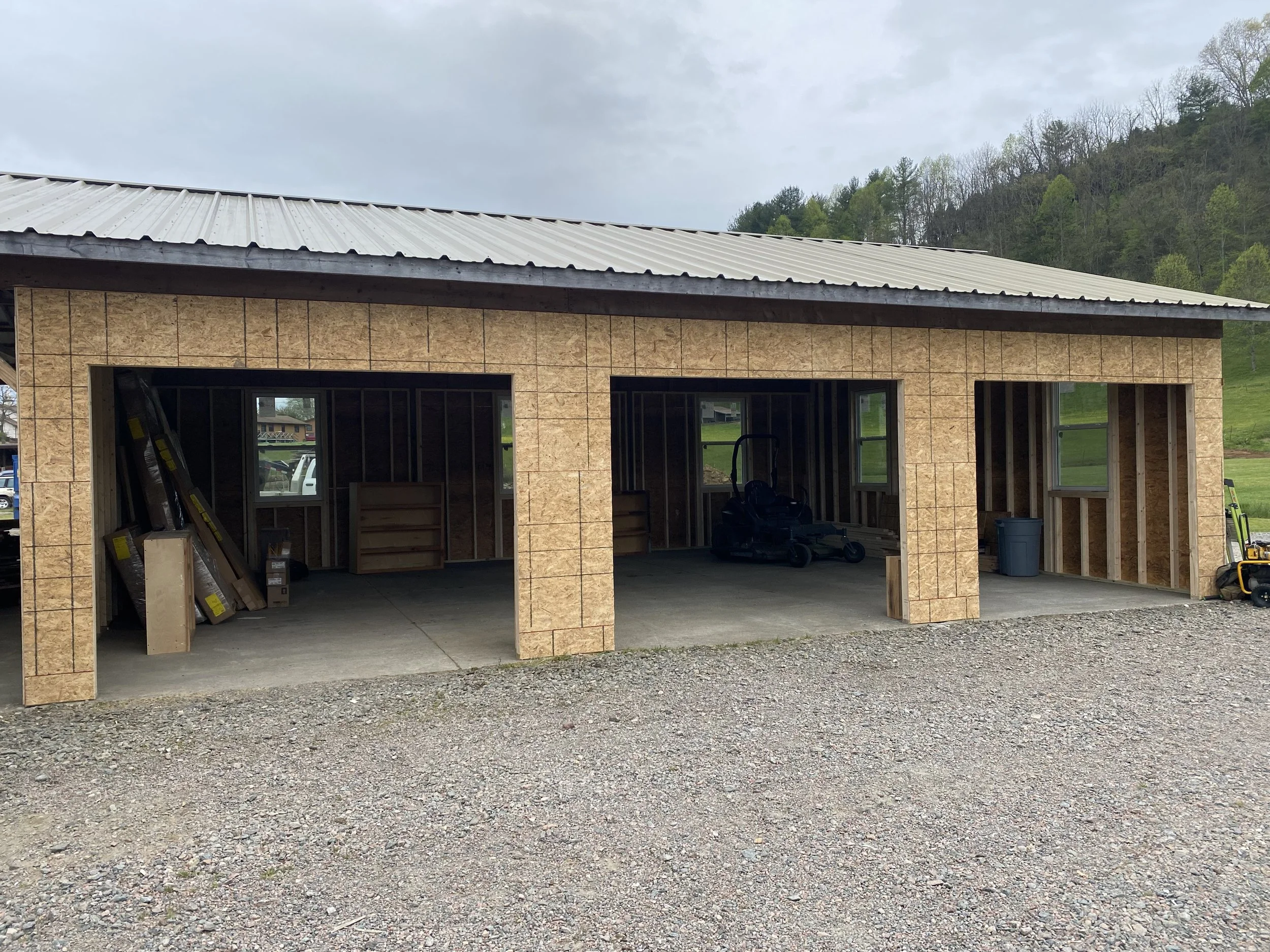 Under-construction wooden garage by Antonio’s Construction providing exterior construction in Ashe County and Watauga County, NC