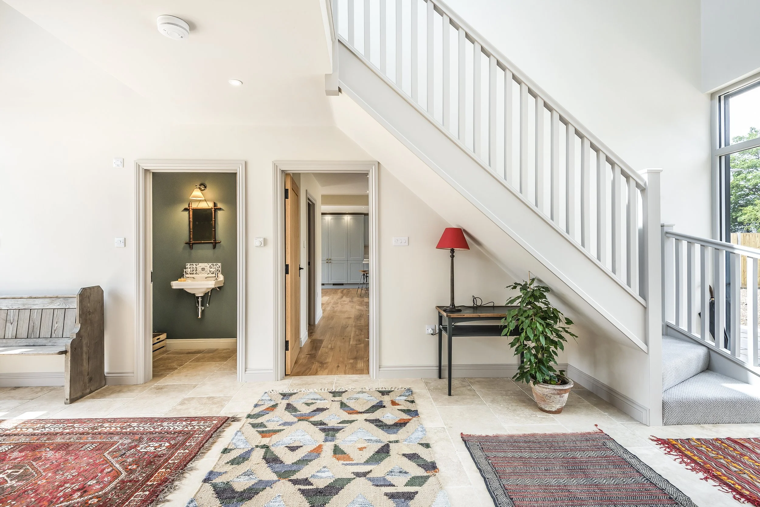 Hallway in barn conversion with cloakroom