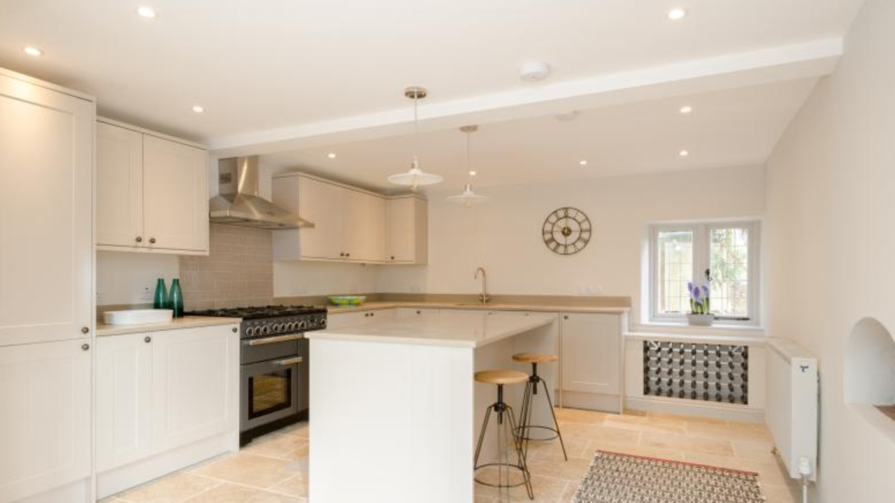 Kitchen in listed thatched cottage 