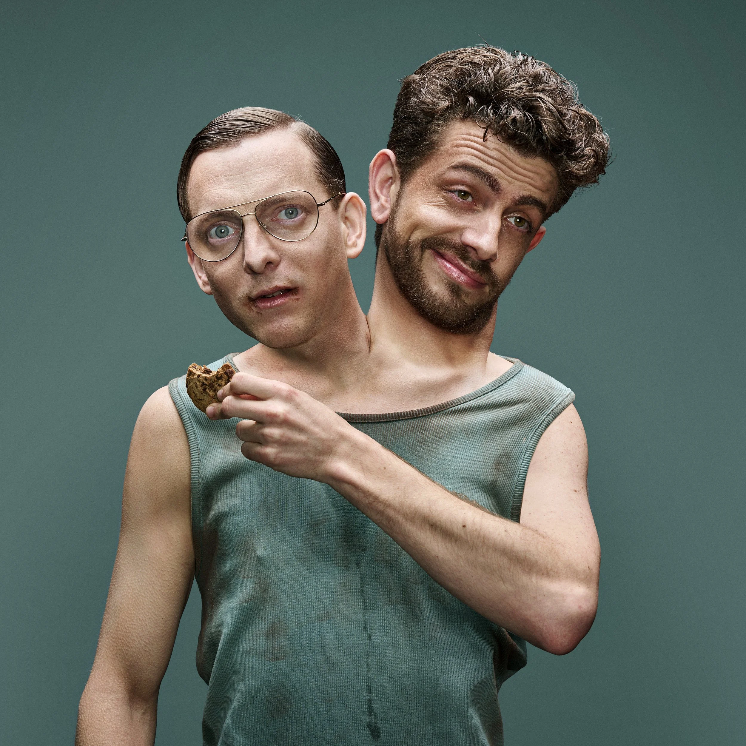 A person with two faces, one looking confused wearing glasses and the other smiling with a beard, holding a cookie.