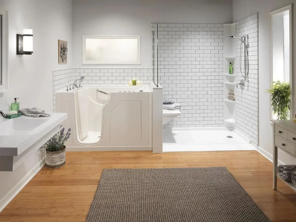 HM Remodeling walk-in tub installation with low step-in door and subway tile surround for accessible bathroom in South Bend Indiana
