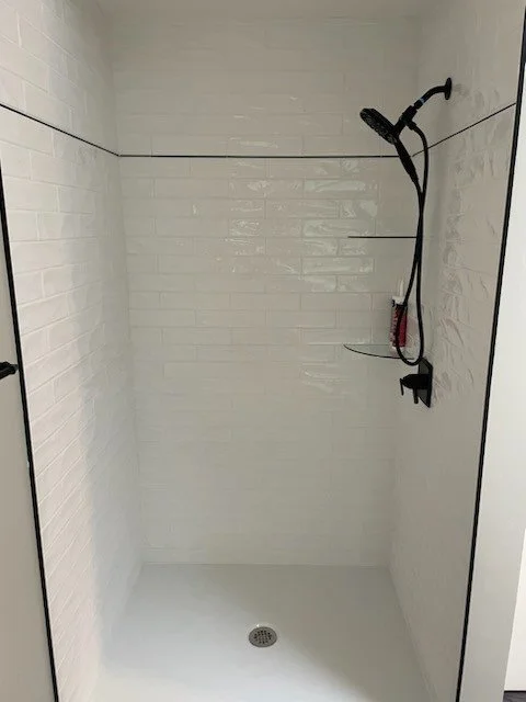 HM Remodeling white subway tile tub surround installation in Granger Indiana