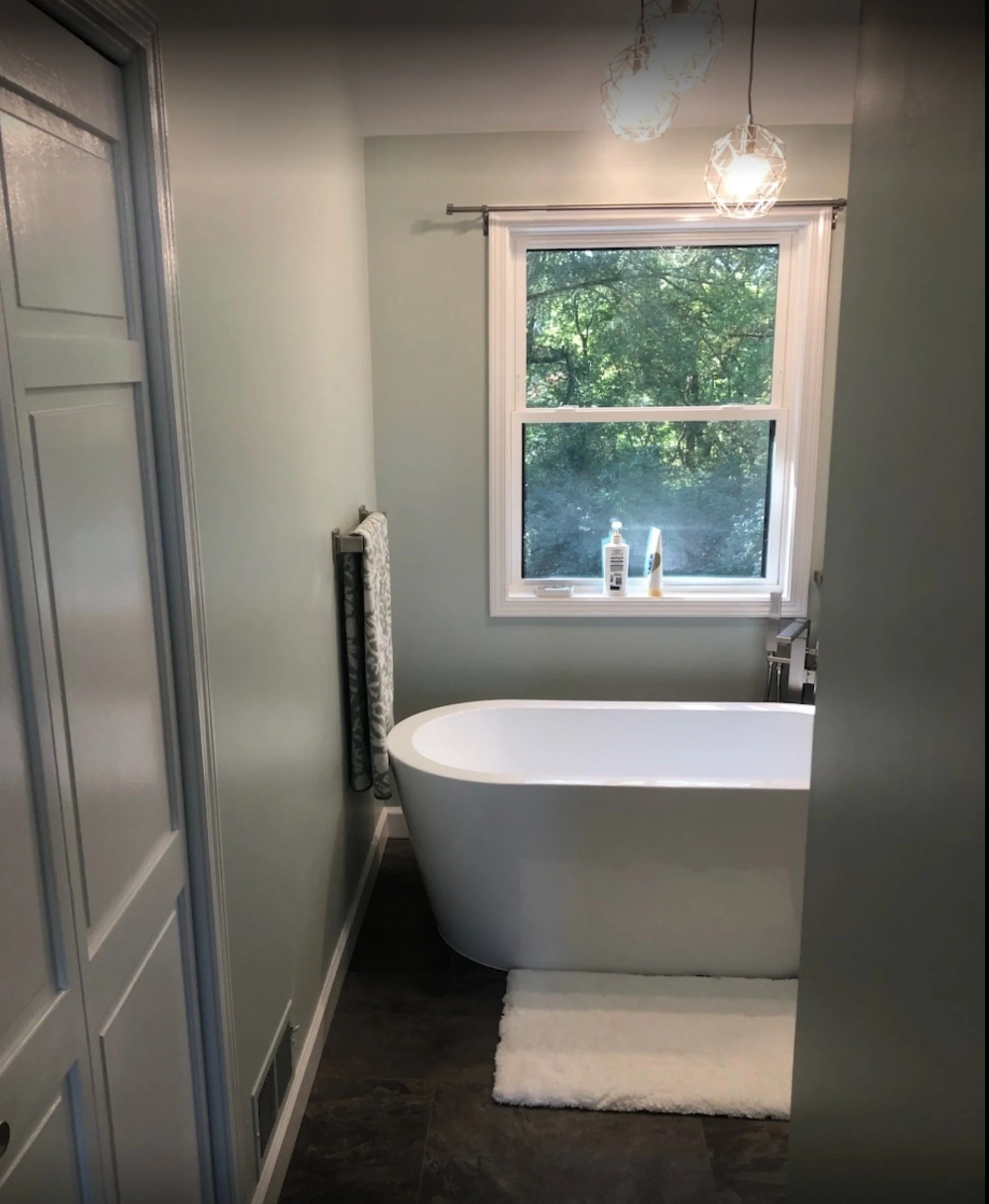 HM Remodeling freestanding soaking tub with glass block window in Granger Indiana