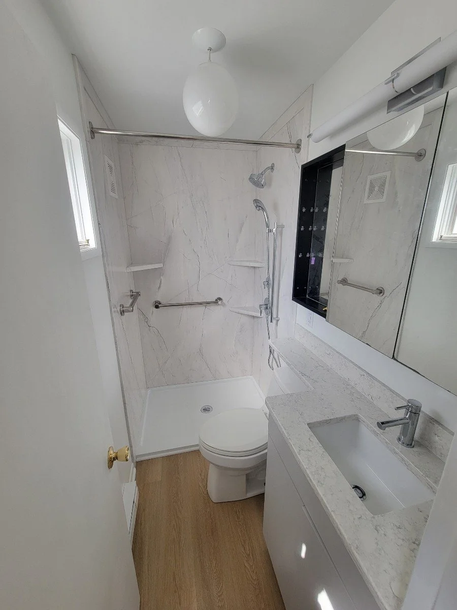 HM Remodeling white acrylic shower installation in Swanson Highlands South Bend Indiana