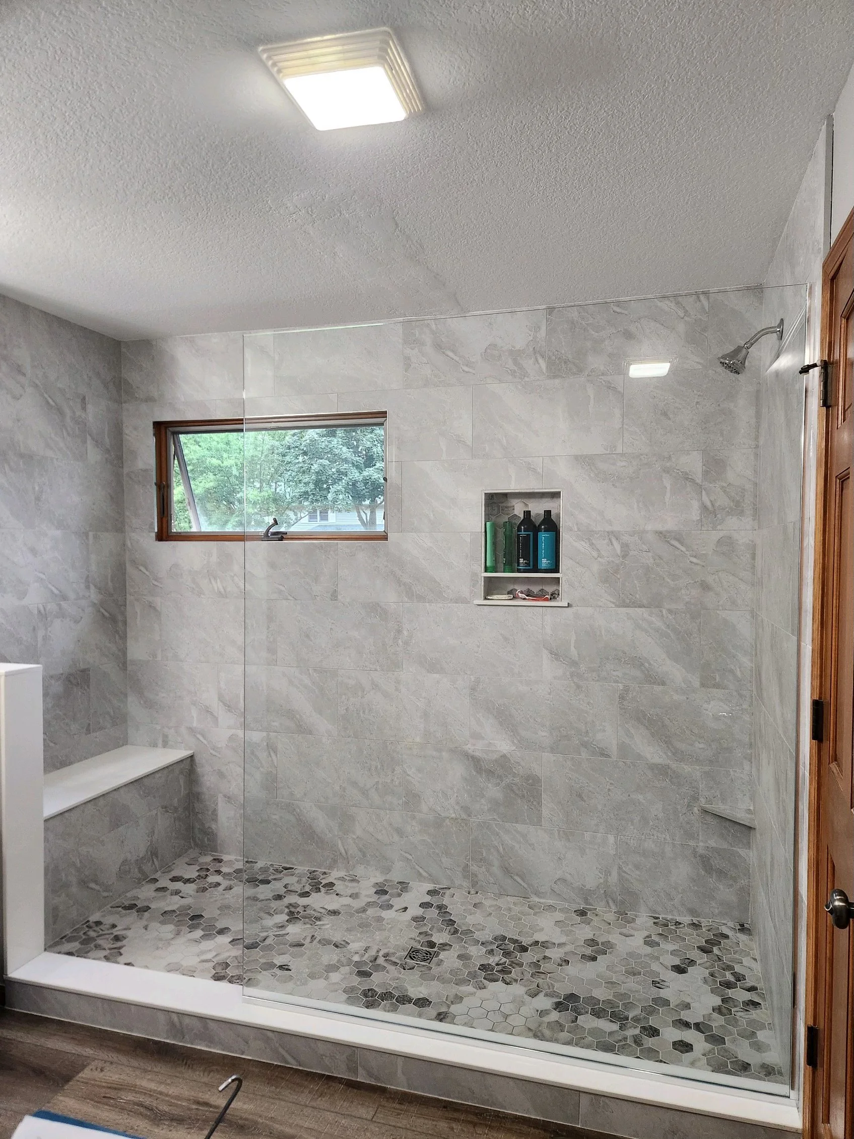 HM Remodeling acrylic shower surround installation completed in one day in South Bend Indiana