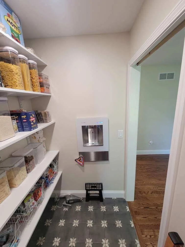 HM Remodeling custom pantry remodel with open shelving patterned tile floor and built-in water bottle filler in Granger Indiana