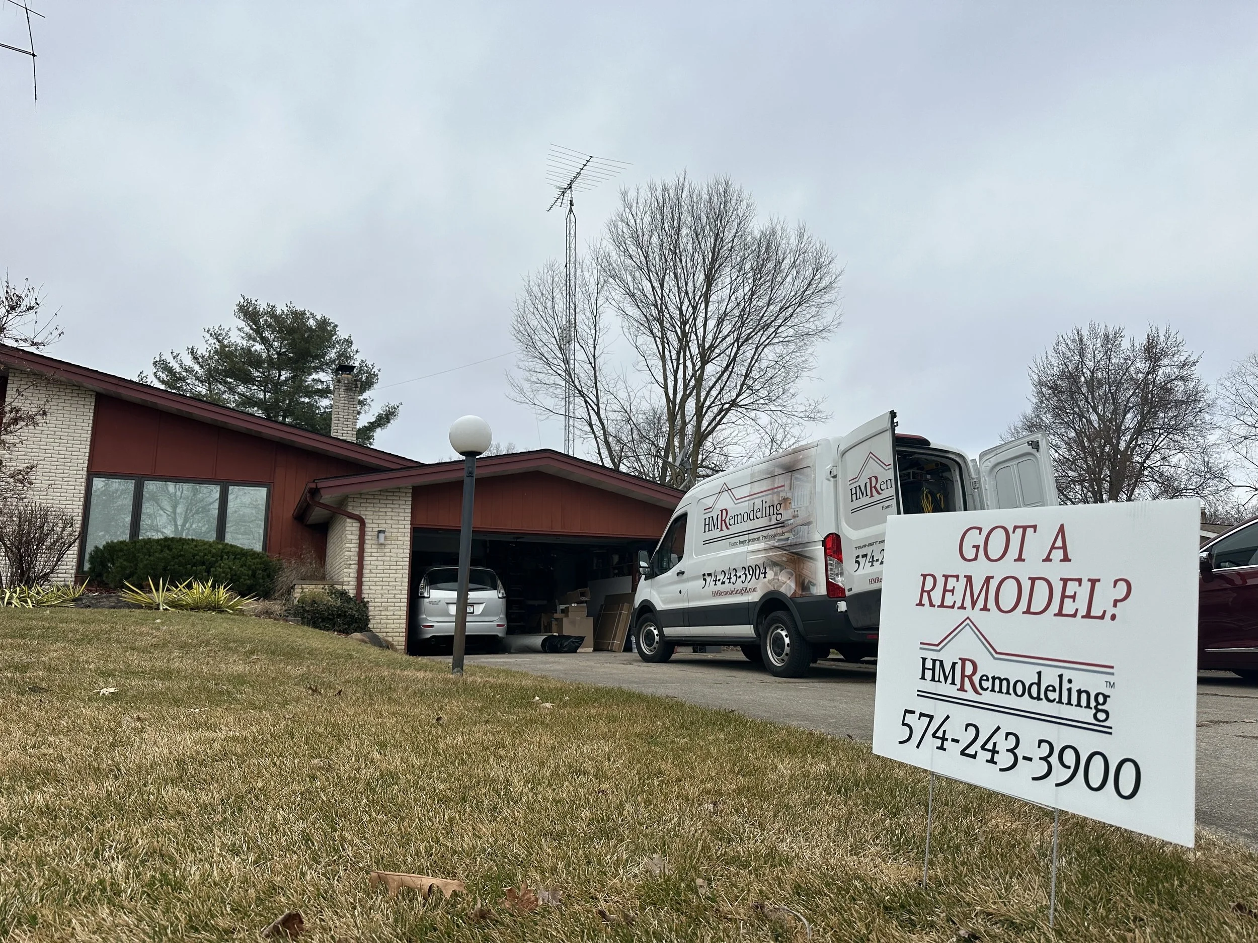 HM Remodeling van with Got a Remodel signage parked at a job site in South Bend Indiana