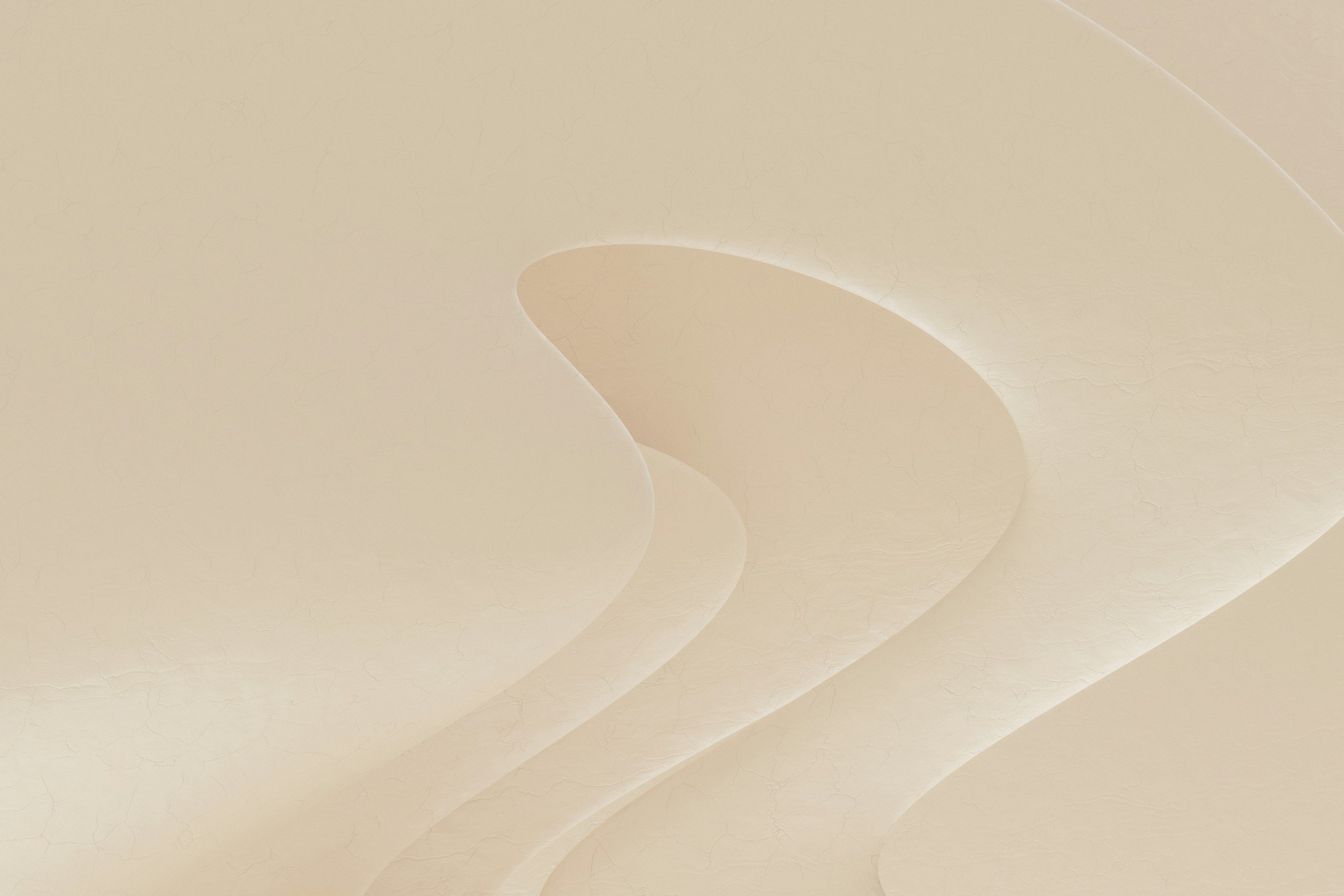 Close-up of a beige paper with layers and a textured surface.