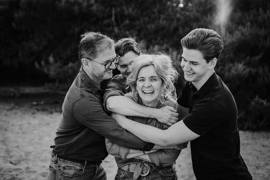 Familiefoto vader moeder en twee tienerzonen