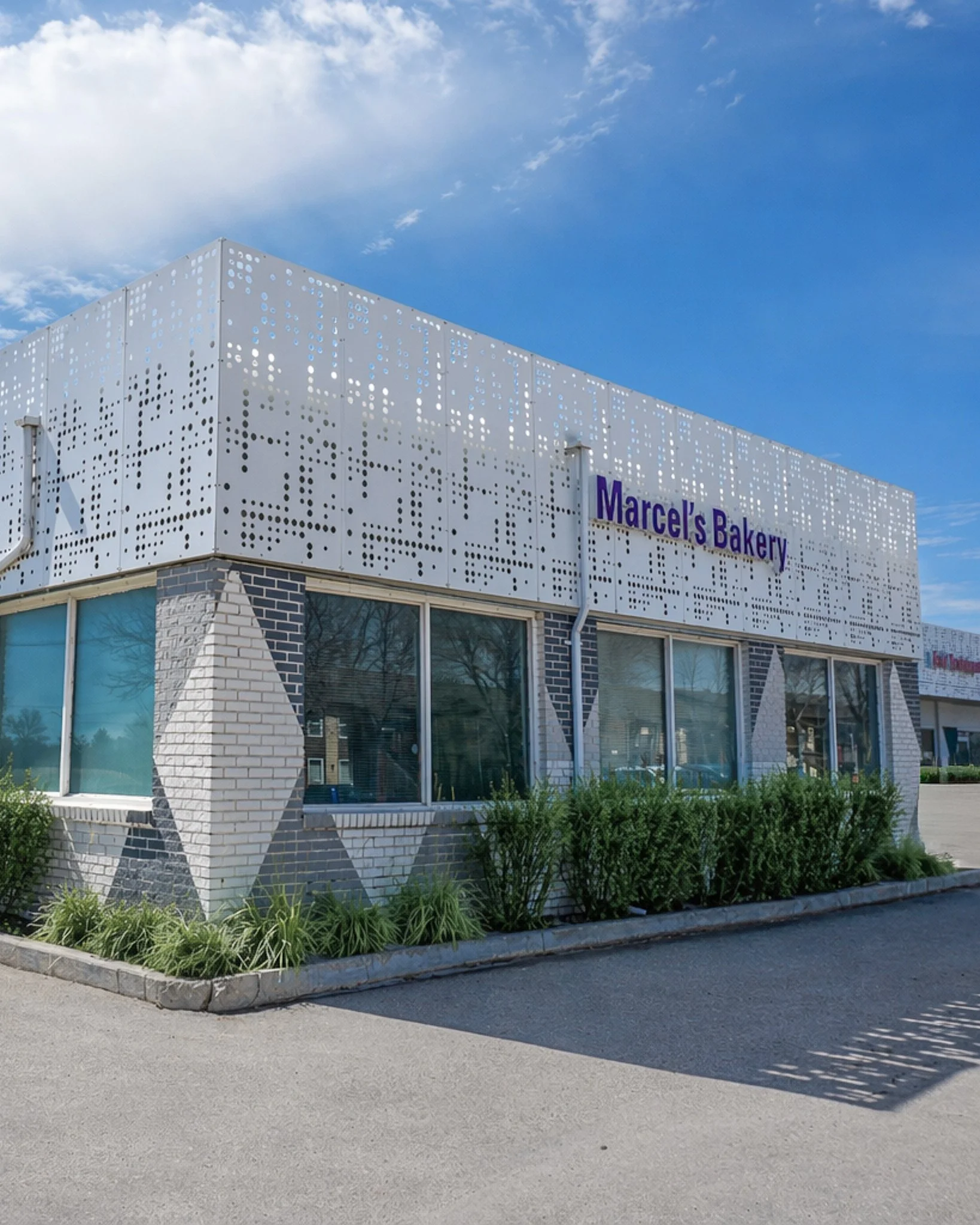 For Marcel's Bakery, our goal was to transform an existing building into a more contemporary and visually distinctive destination. Through strategic asset repositioning, the exterior was reimagined with a refined material palette, perforated metal sc