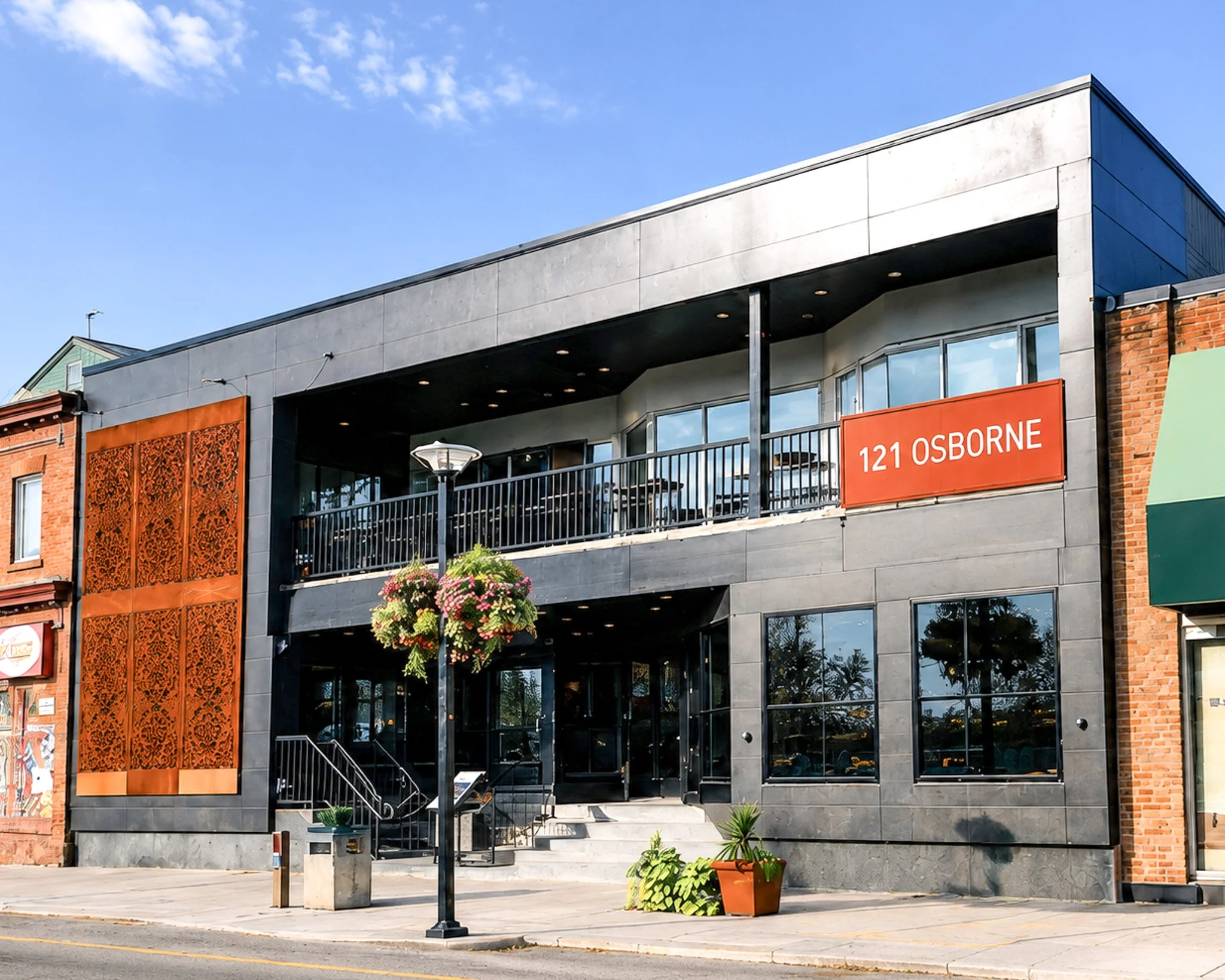 A look at 121 Osborne Street. This building was transformed through bold contemporary materials using dark cladding and warm corten steel detailing to create a modern fa&ccedil;ade that still feels at home within the existing neighbourhood. No need t
