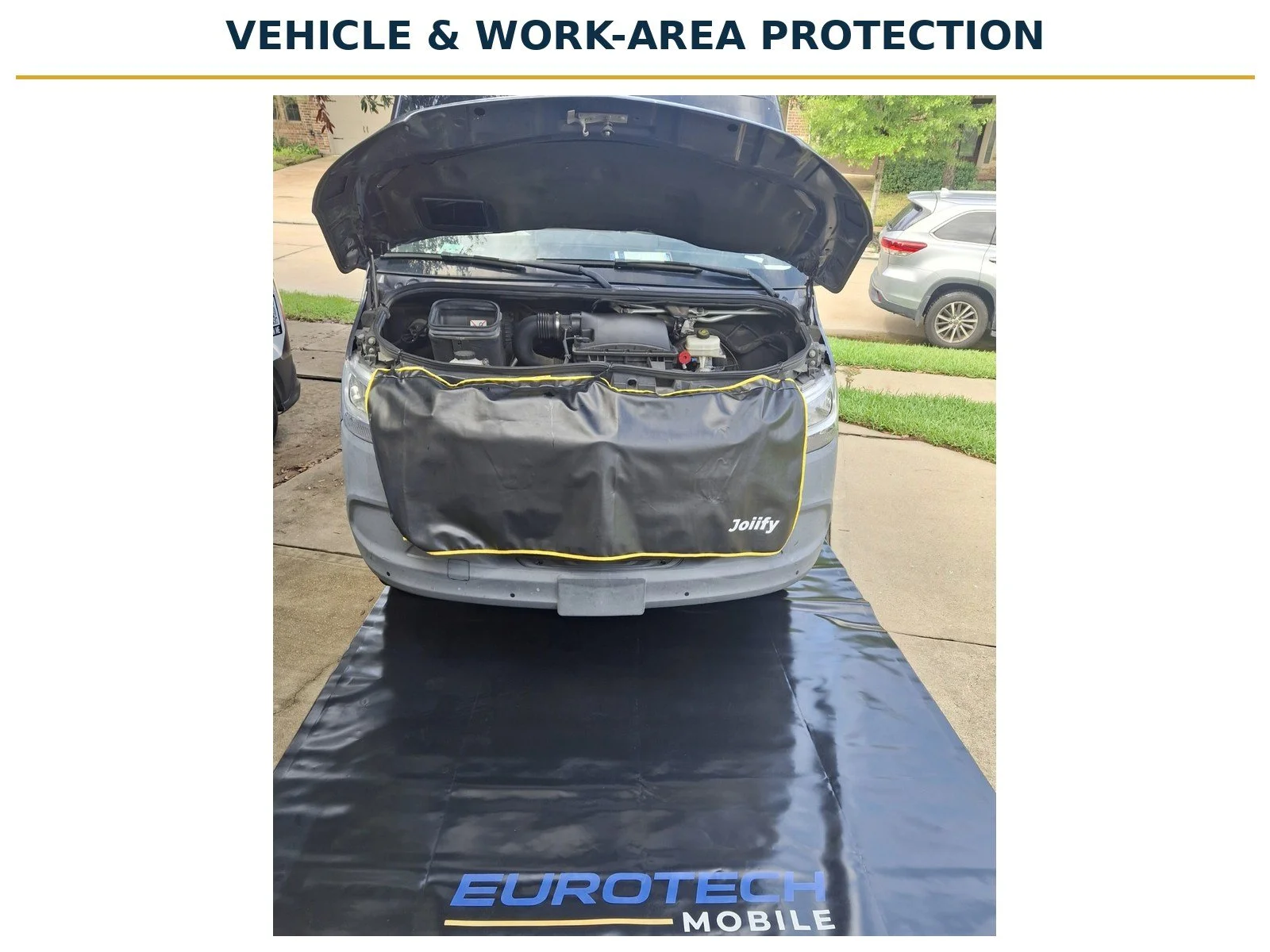 Mercedes-Benz Sprinter with its hood open, a protective front cover and a EuroTech Mobile branded ground mat protecting the driveway work area.