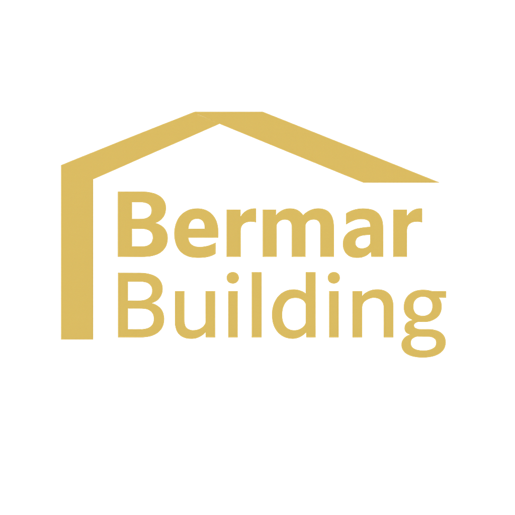 Logo of the Bernar Building with a stylized gold roof and gold text on a black background.
