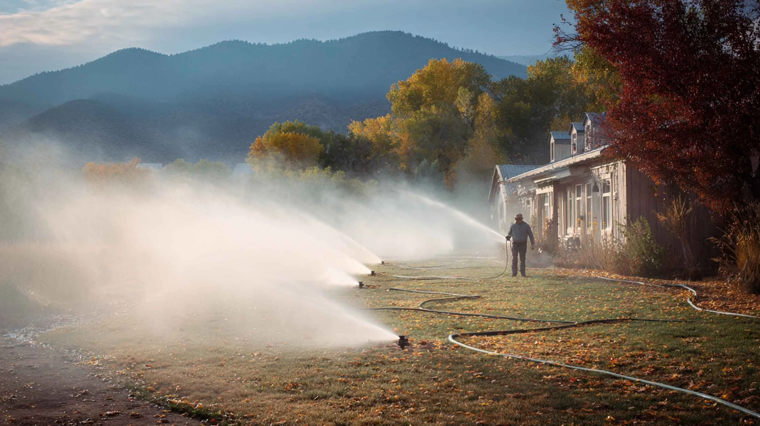 a man performing sprinkler installation and sprinkler maintenance for a commercial property in durango co