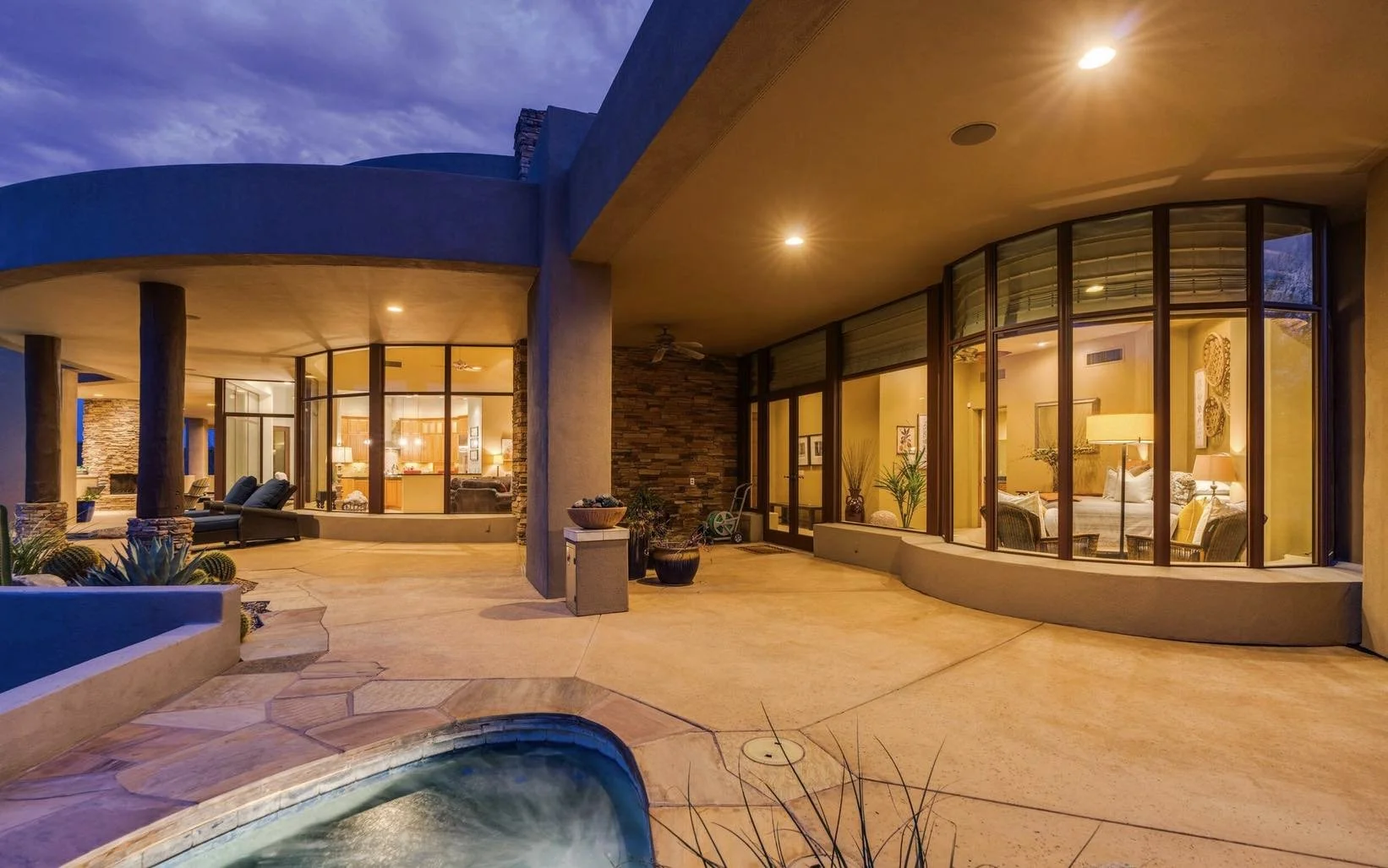 sunset-home-exterior-shot-with-bright-lights