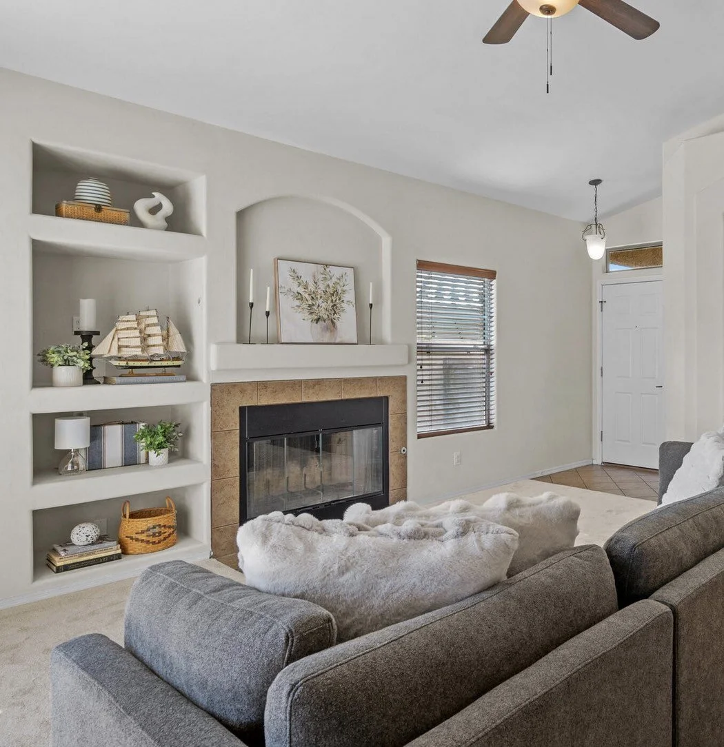 staged-living-room-with-shelves-and-couch