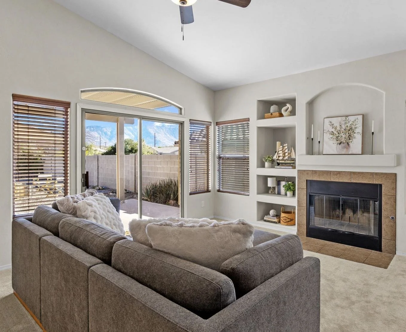 fireplace staged living room with catalina mountain views