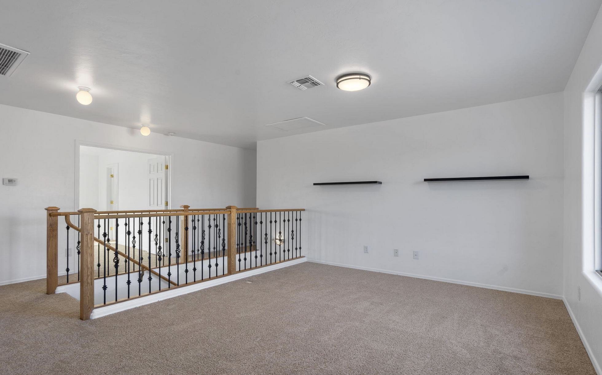 spacious-living-room-with-stairs