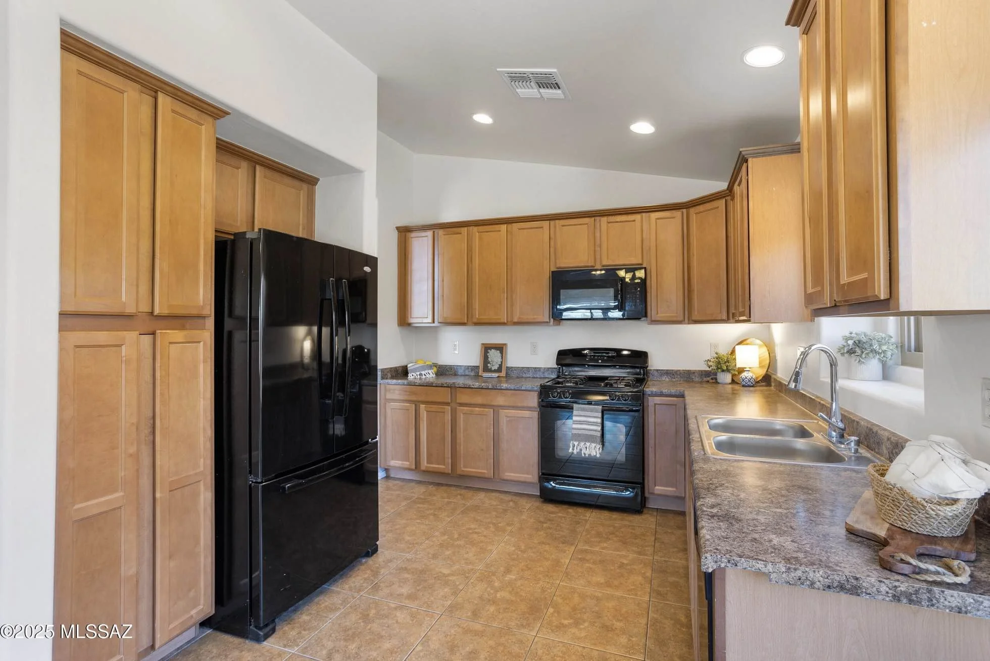 kitchen-with-wood-cabinets-newer-appliances