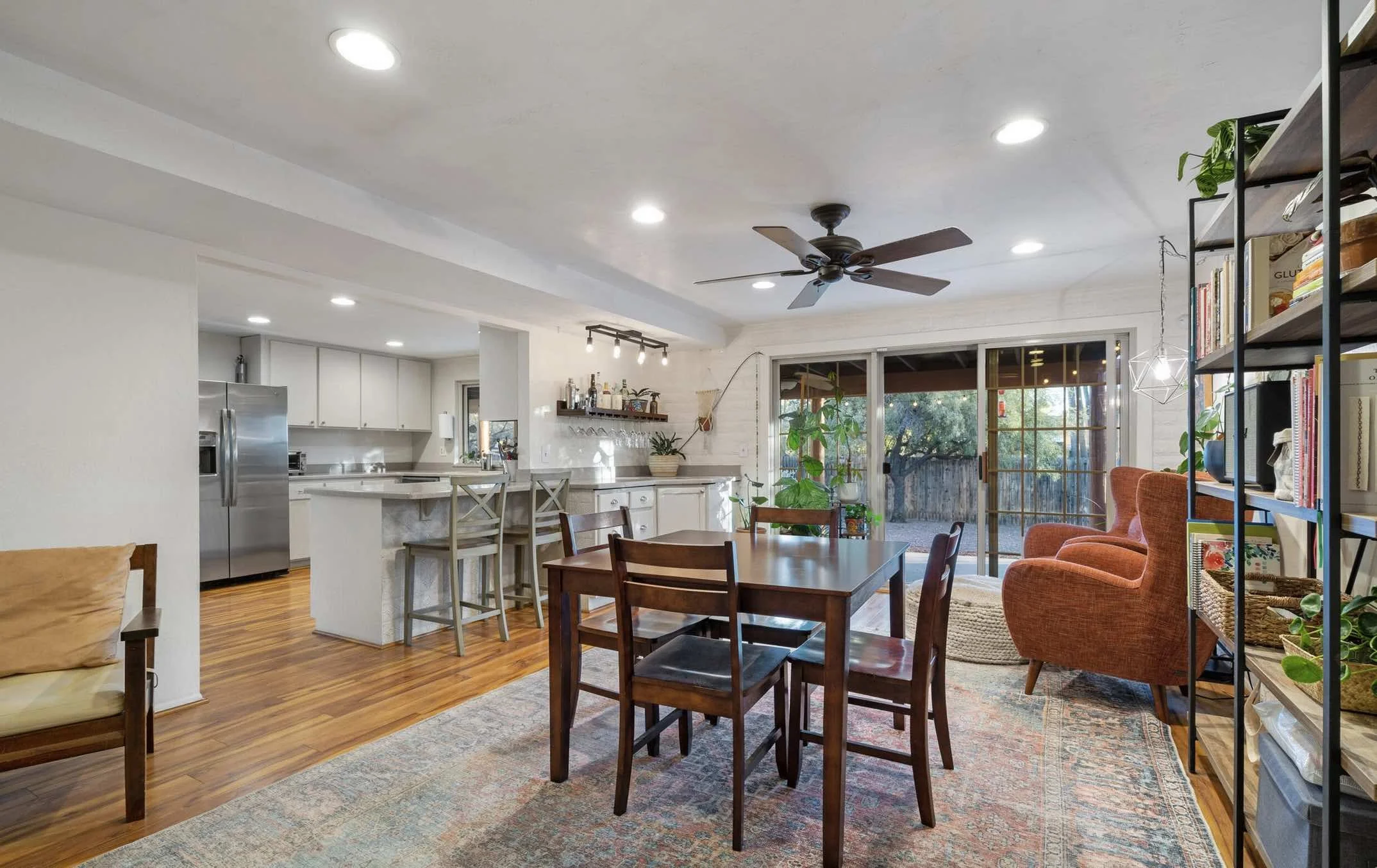 updated-kitchen-and-flooring-with-large-windows-natural-light