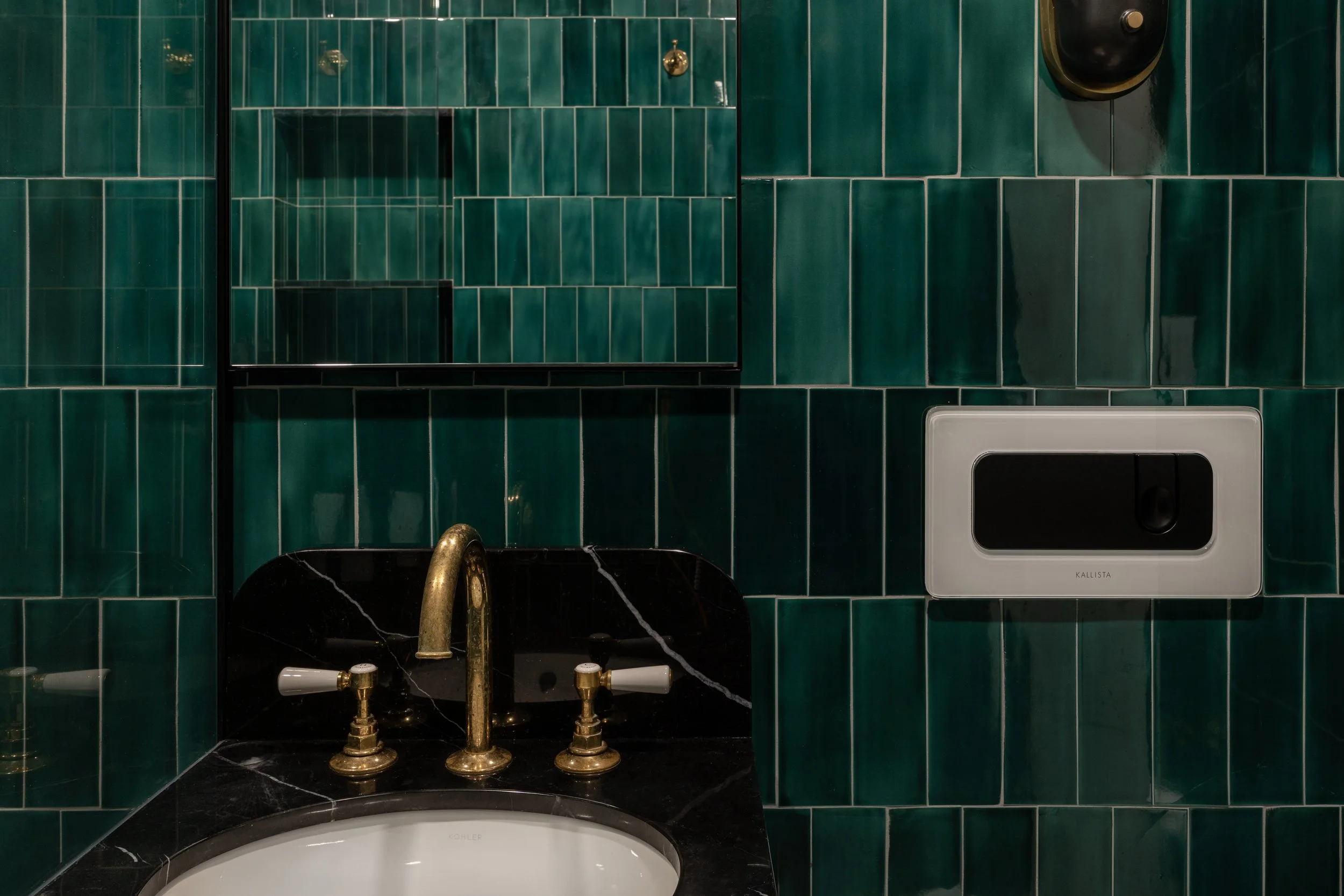 Bathroom: Brooklyn apartment bathroom featuring green ceramic tile, marble flooring, and a custom walnut vanity.