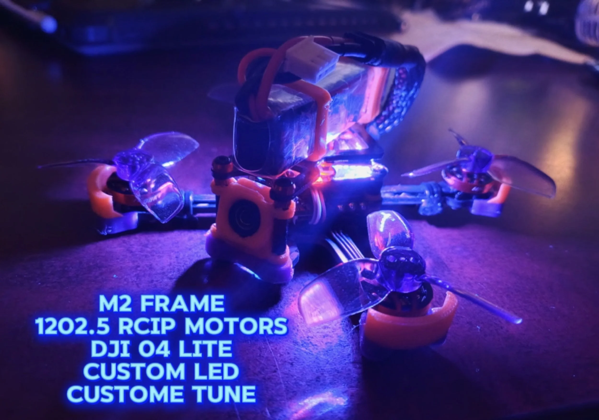 Close-up of a small drone with illuminated LED lights, electronic components, and a text overlay containing technical specifications.
