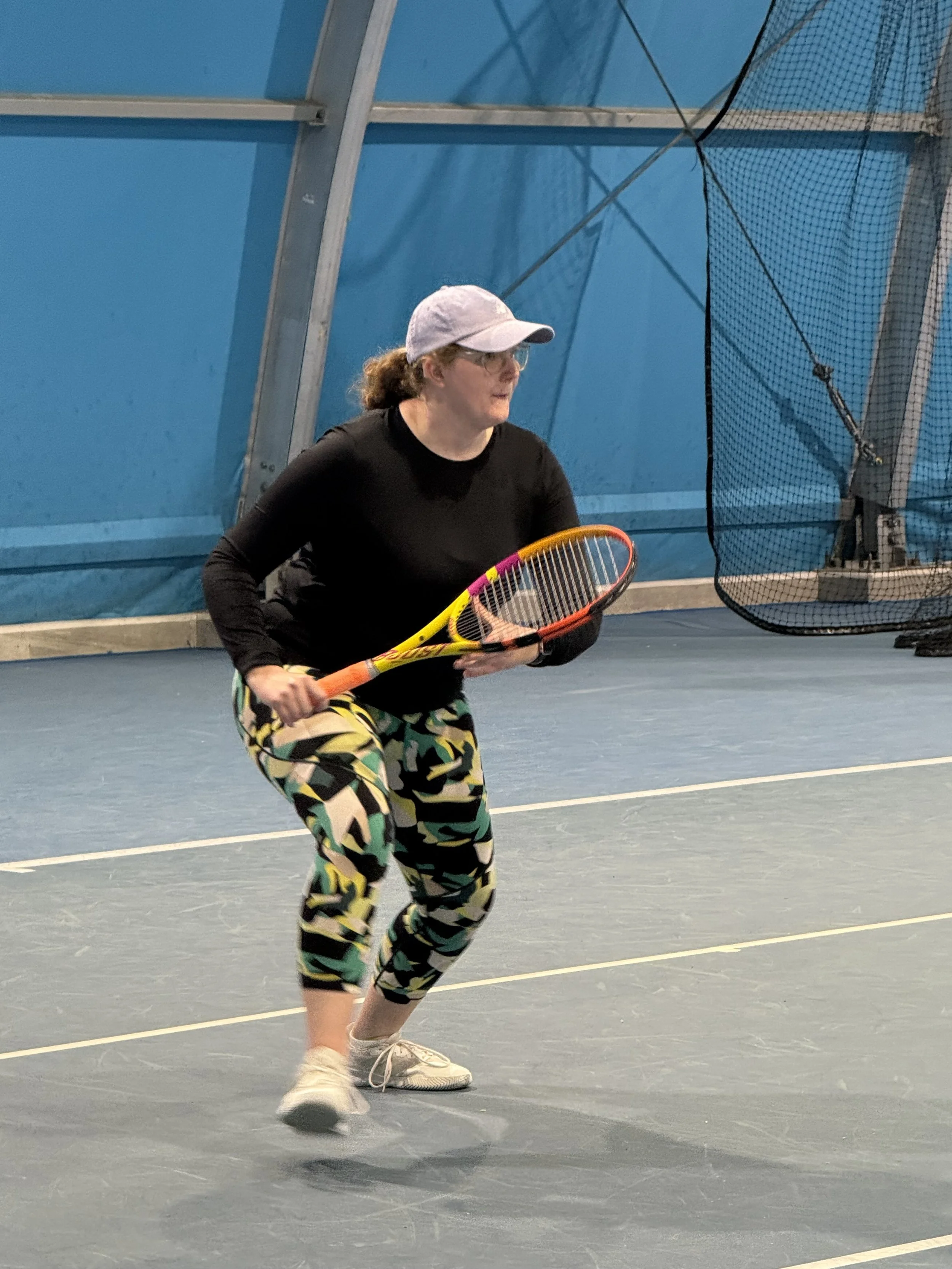 Samira from Australia, preparing to hit a forehand.