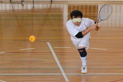 BLV Tennis inventor, Miyoshi Takei, hitting a forehand. Photo courtesy of Tomohisa Tagawa