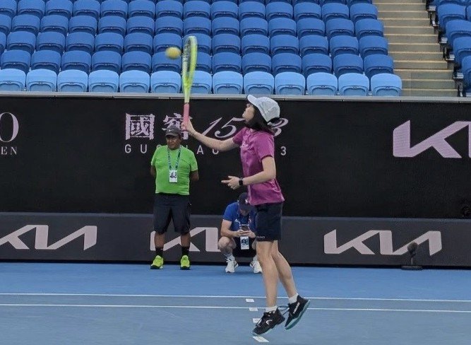 Liz Conzemius from Luxembourg hitting a serve.