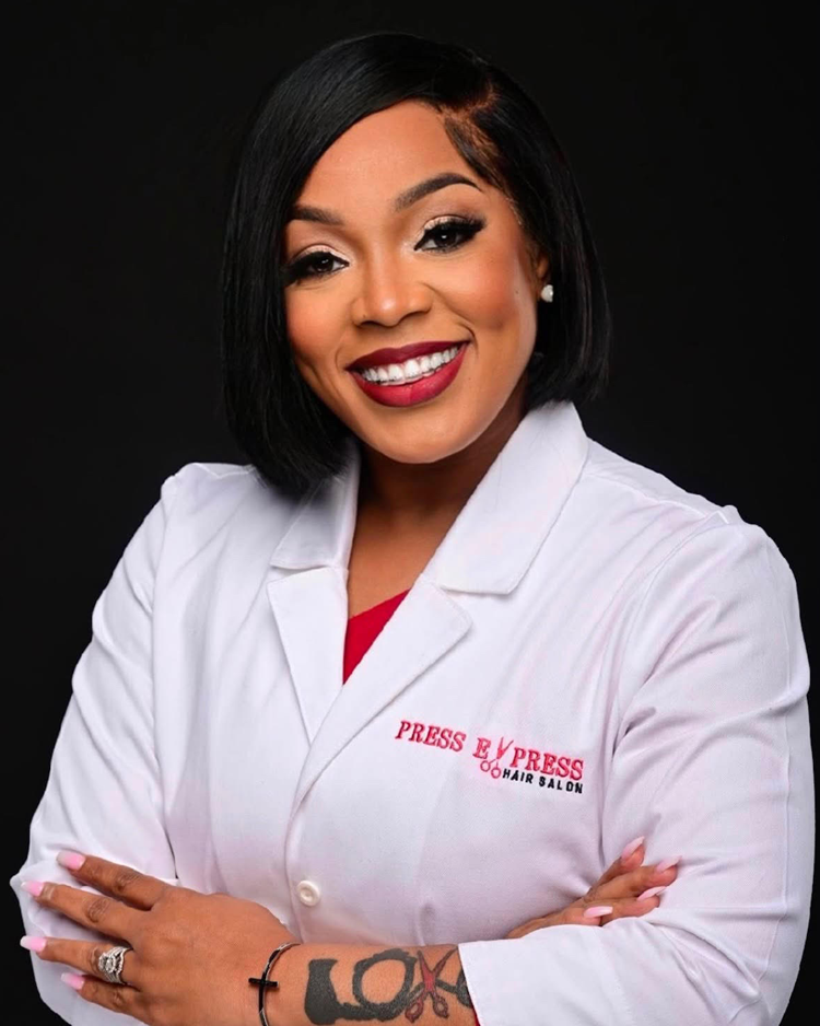 Shanikia, known throughout the industry as The Healthy Hair Doctor, is a master hairstylist, salon owner, and healthy hair expert dedicated to helping clients achieve their strongest, healthiest hair.