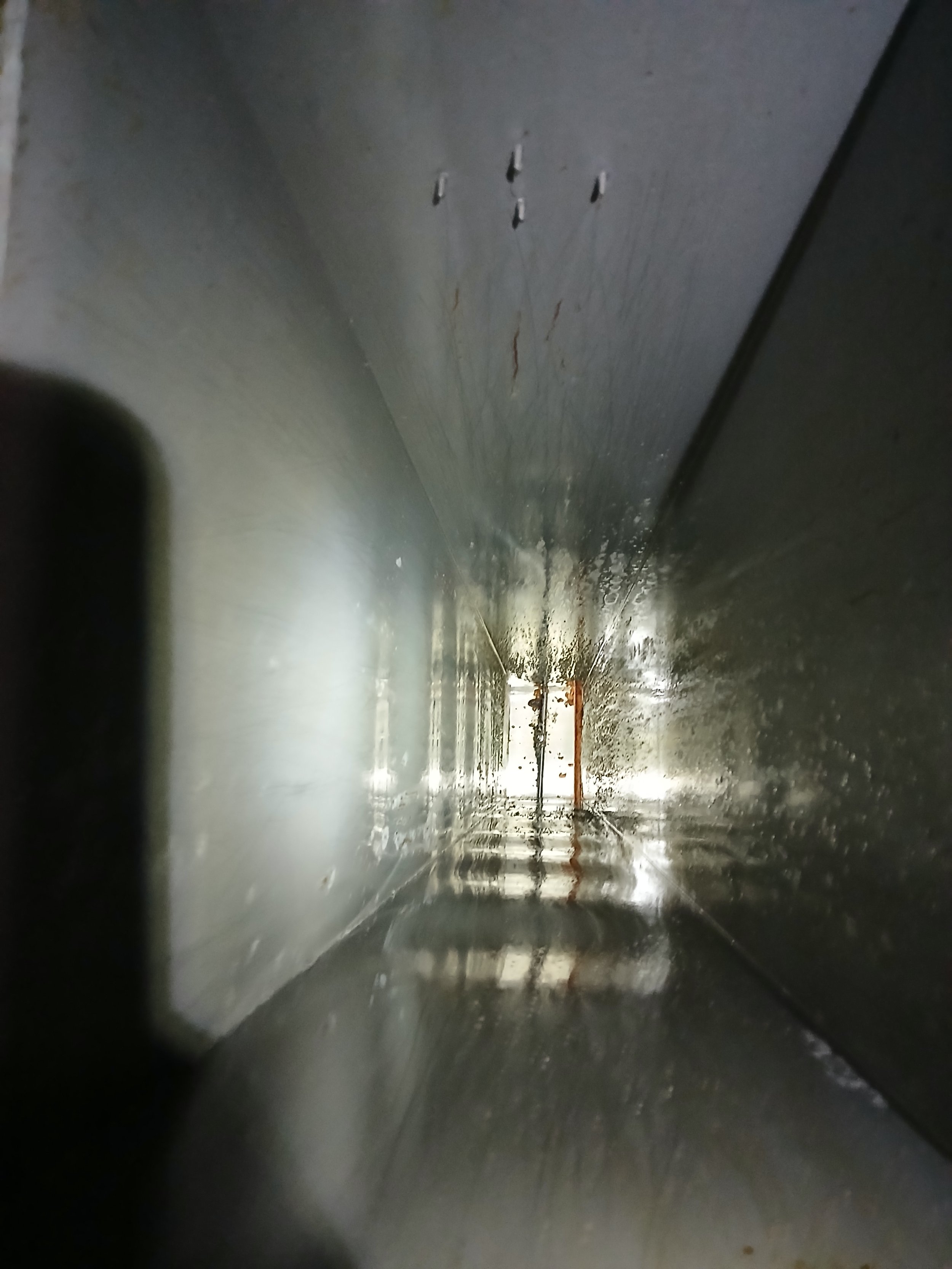 Looking inside a clean kitchen exhaust duct