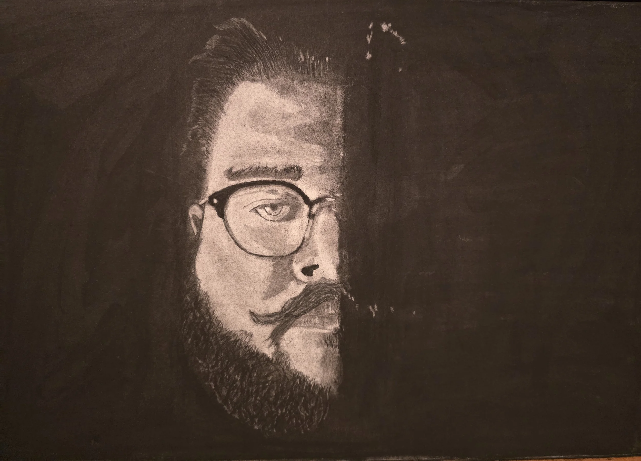 Split light Self Portrait (Charcoal).jpg