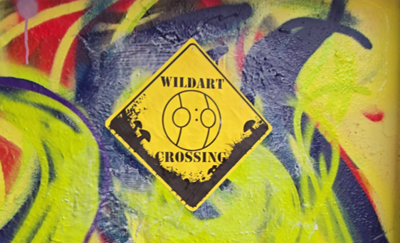 Wild Art Crossing in the Wild (Wheatpasted Poster Graffiti).png
