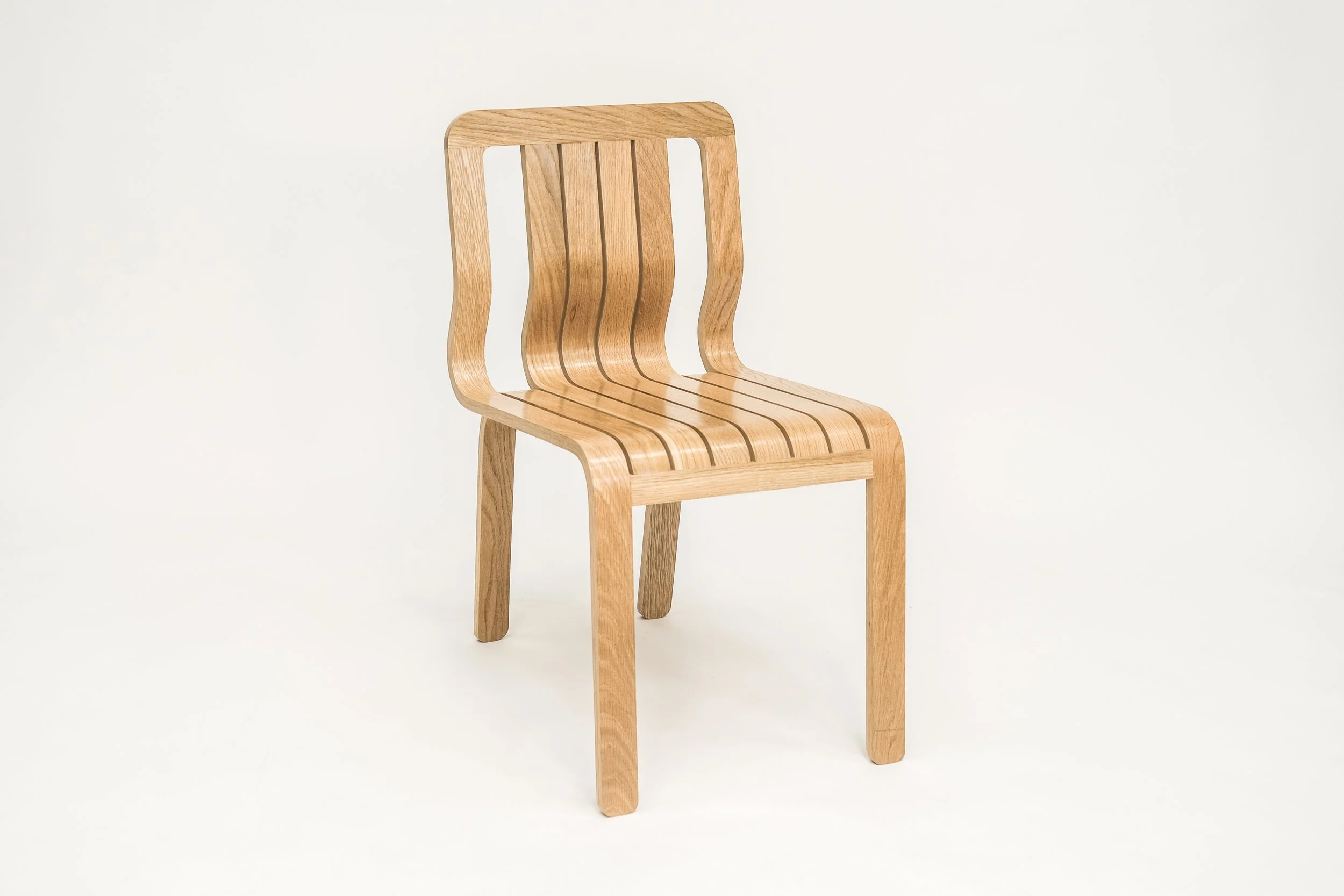 A wooden chair with a slatted backrest and seat, set against a plain white background.